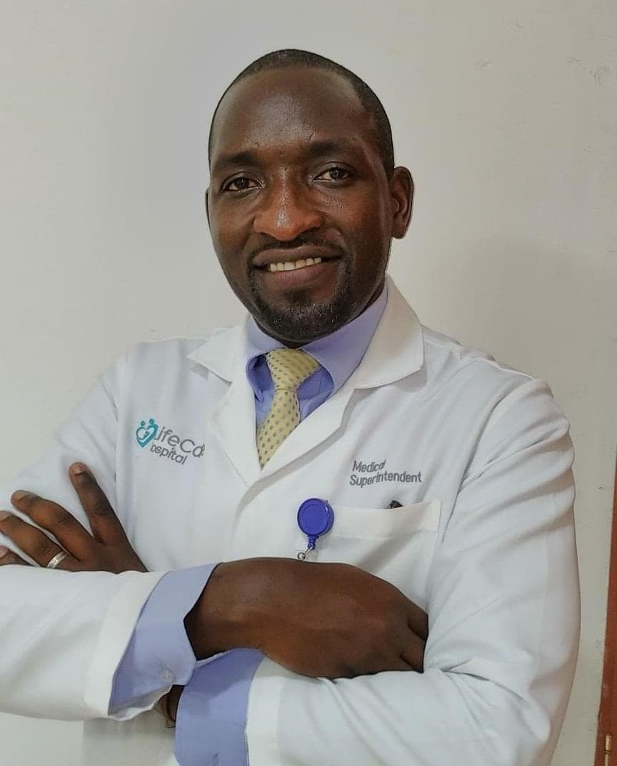Dr Victor Ng'ani in a professional medical leadership portrait